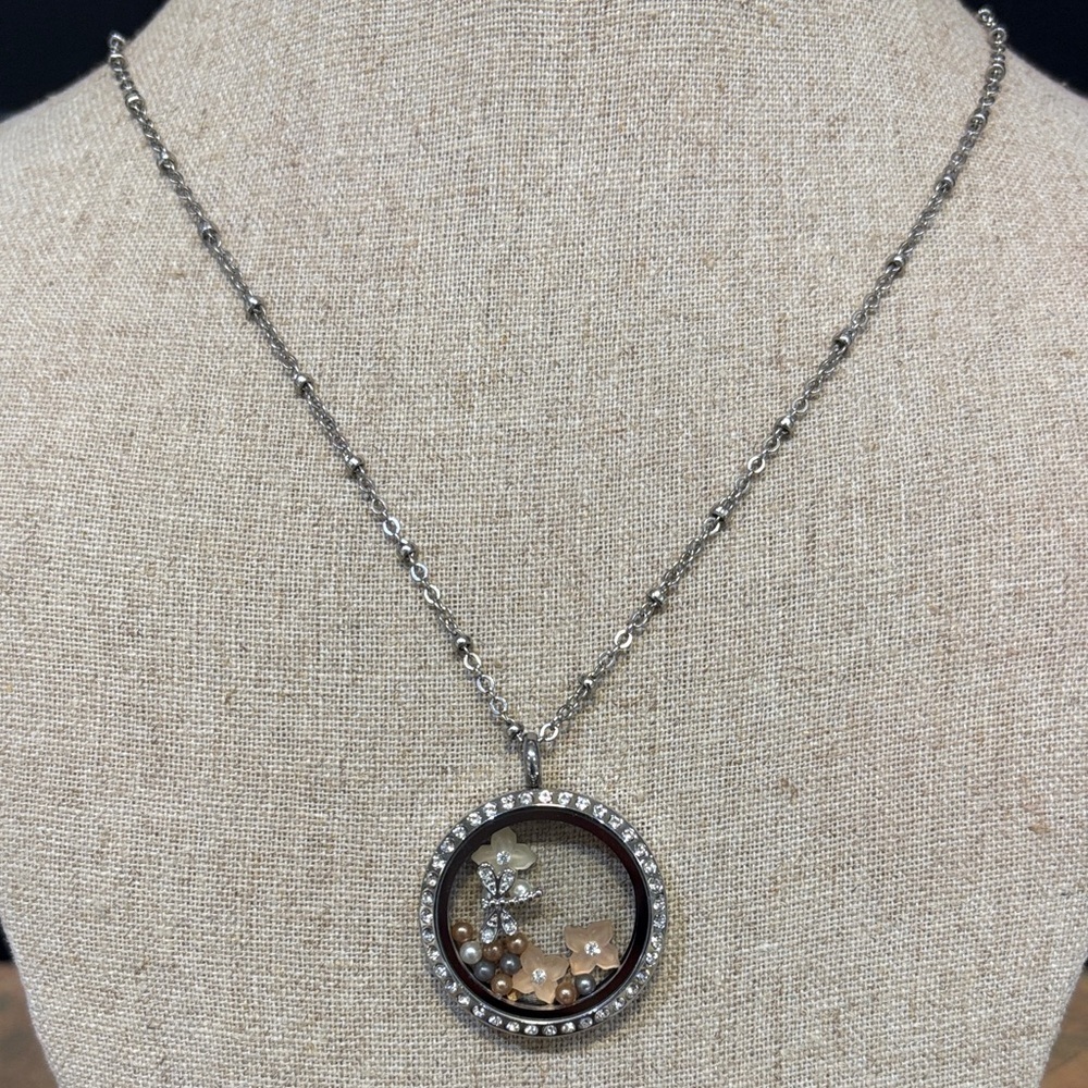 South Hill Design pendant with charms and long silver necklaces